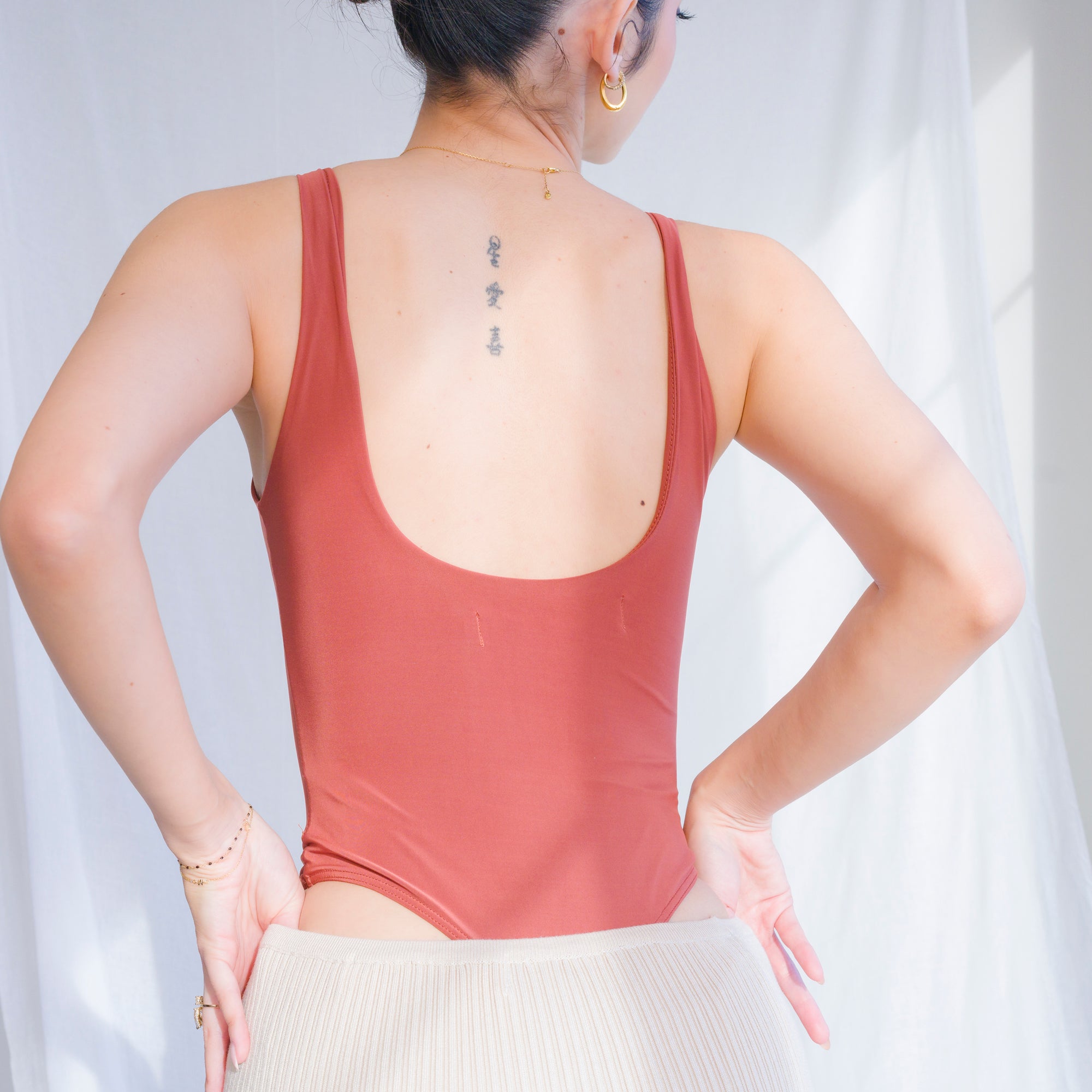 Luxury-Sheen Bodysuit in Stretchy Performance Fabric